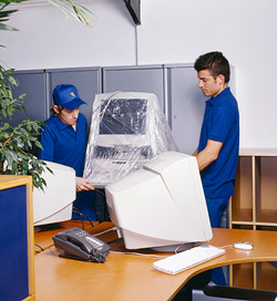 image of mover moving office equipment