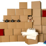 Stack of moving boxes with owner's belongings